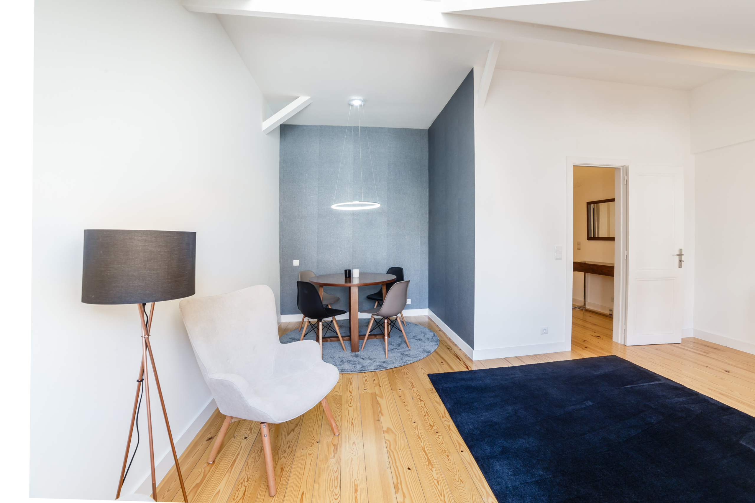 Modern apartment with white walls and light wooden floor Luxury Home for sale